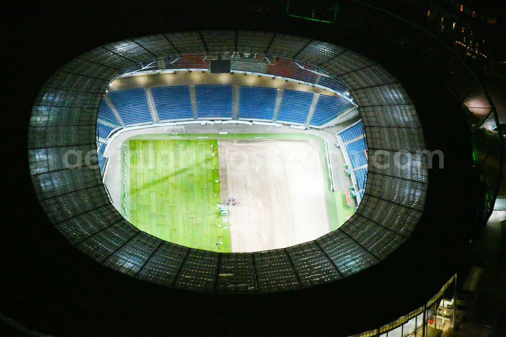 Aerial image at night Hannover - Night lighting Stadium of the Heinz von Heiden Arena (formerly AWD Arena and HDI Arena) on Robert-Enke-Strasse in the Calenberger Neustadt district of Hanover in Lower Saxony