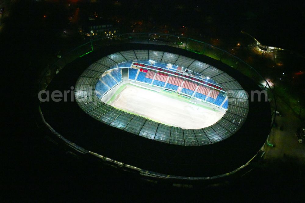 Hannover at night from the bird perspective: Night lighting Stadium of the Heinz von Heiden Arena (formerly AWD Arena and HDI Arena) on Robert-Enke-Strasse in the Calenberger Neustadt district of Hanover in Lower Saxony