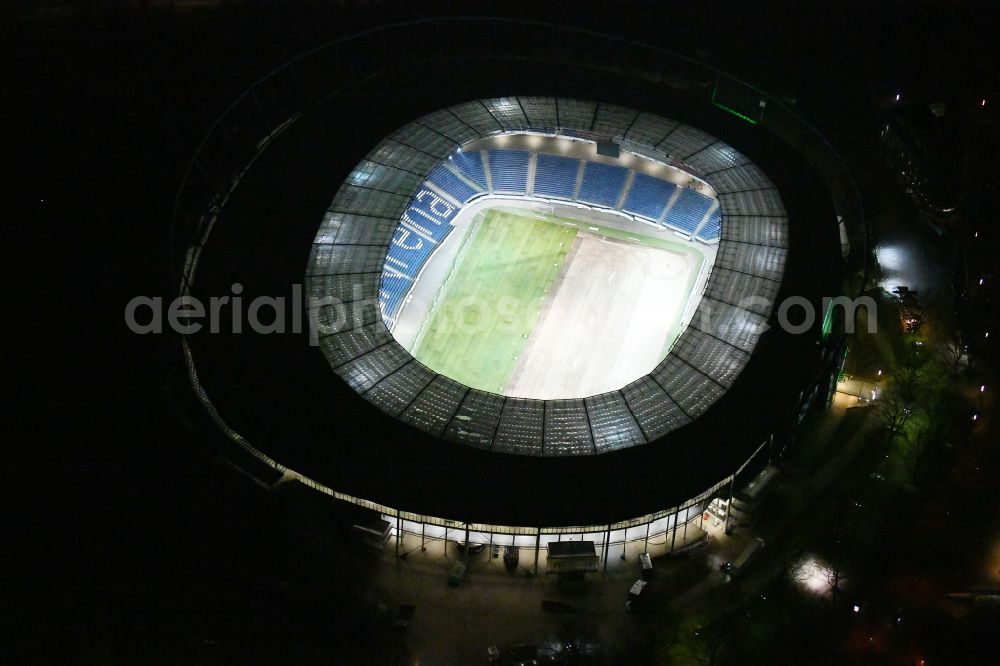 Hannover at night from above - Night lighting Stadium of the Heinz von Heiden Arena (formerly AWD Arena and HDI Arena) on Robert-Enke-Strasse in the Calenberger Neustadt district of Hanover in Lower Saxony