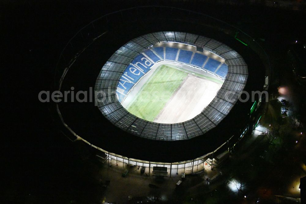 Hannover at night from the bird perspective: Night lighting Stadium of the Heinz von Heiden Arena (formerly AWD Arena and HDI Arena) on Robert-Enke-Strasse in the Calenberger Neustadt district of Hanover in Lower Saxony