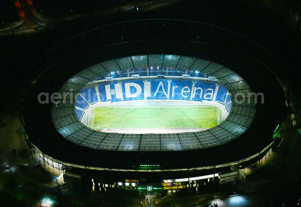 Hannover at night from the bird perspective: Night lighting Stadium of the Heinz von Heiden Arena (formerly AWD Arena and HDI Arena) on Robert-Enke-Strasse in the Calenberger Neustadt district of Hanover in Lower Saxony