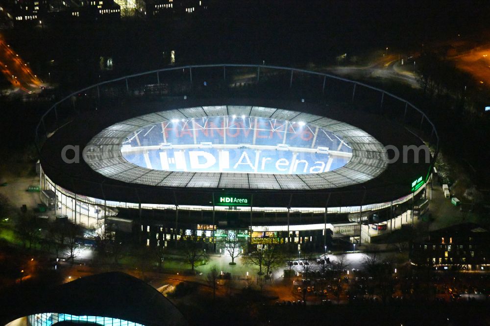 Hannover at night from the bird perspective: Night lighting Stadium of the Heinz von Heiden Arena (formerly AWD Arena and HDI Arena) on Robert-Enke-Strasse in the Calenberger Neustadt district of Hanover in Lower Saxony