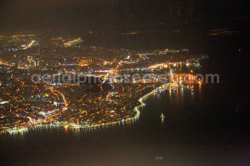 Istanbul at night from the bird perspective: Night lighting district of the Asian part of Istanbul at the eastern shore of the Bosporus district Ueskuedar in Istanbul in Turkey