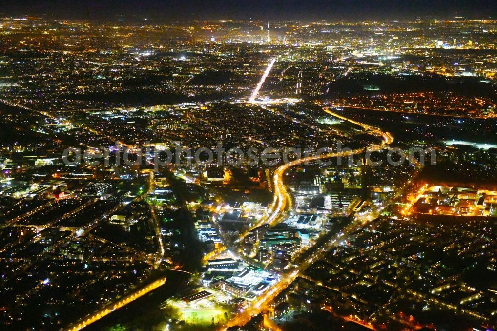 Aerial image at night Berlin - Night lighting District along the Karolinenstrasse - Berliner Strasse in the city in the district Reinickendorf in Berlin, Germany