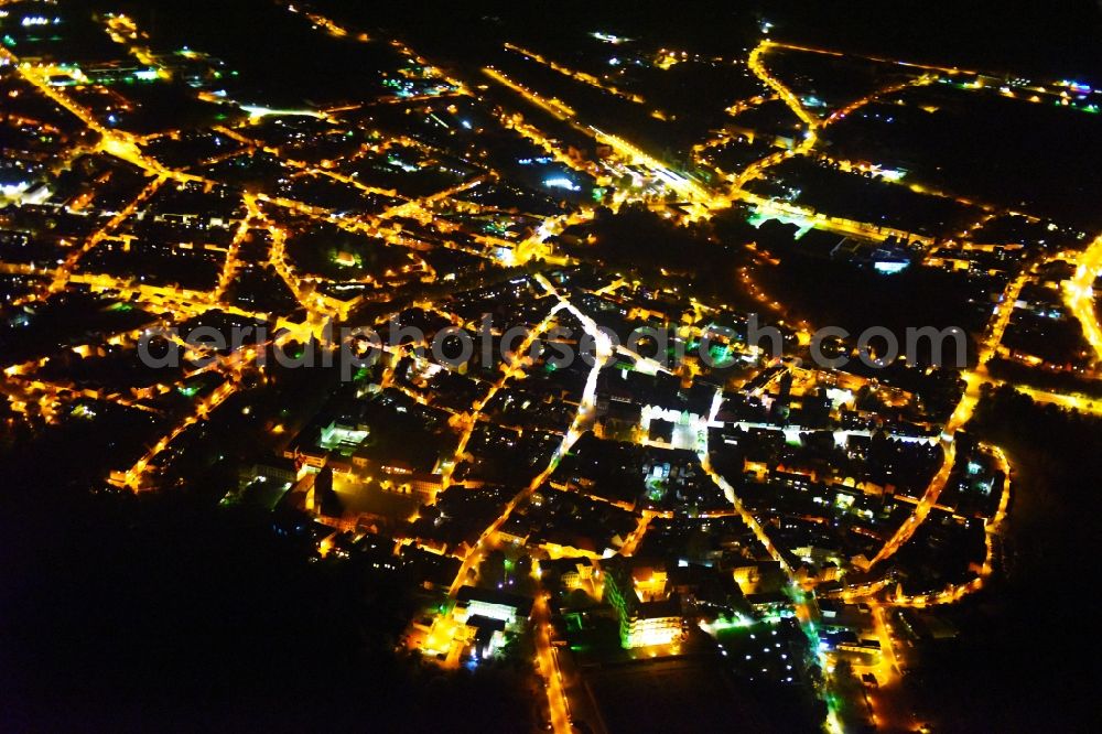 Aerial image at night Güstrow - Night lighting City view of the city area of in Guestrow in the state Mecklenburg - Western Pomerania, Germany