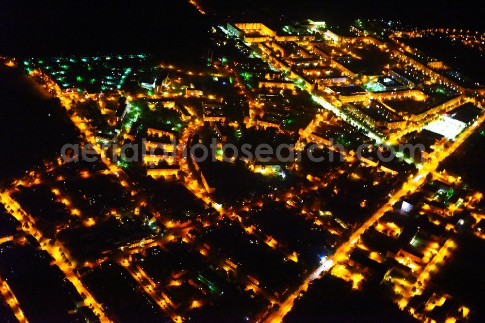 Güstrow at night from the bird perspective: Night lighting City view of the city area of in Guestrow in the state Mecklenburg - Western Pomerania, Germany