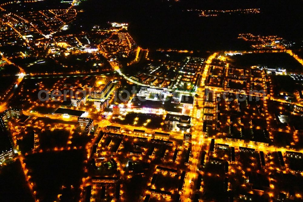 Hoyerswerda at night from the bird perspective: Night lighting city view on down town in Hoyerswerda in the state Saxony, Germany