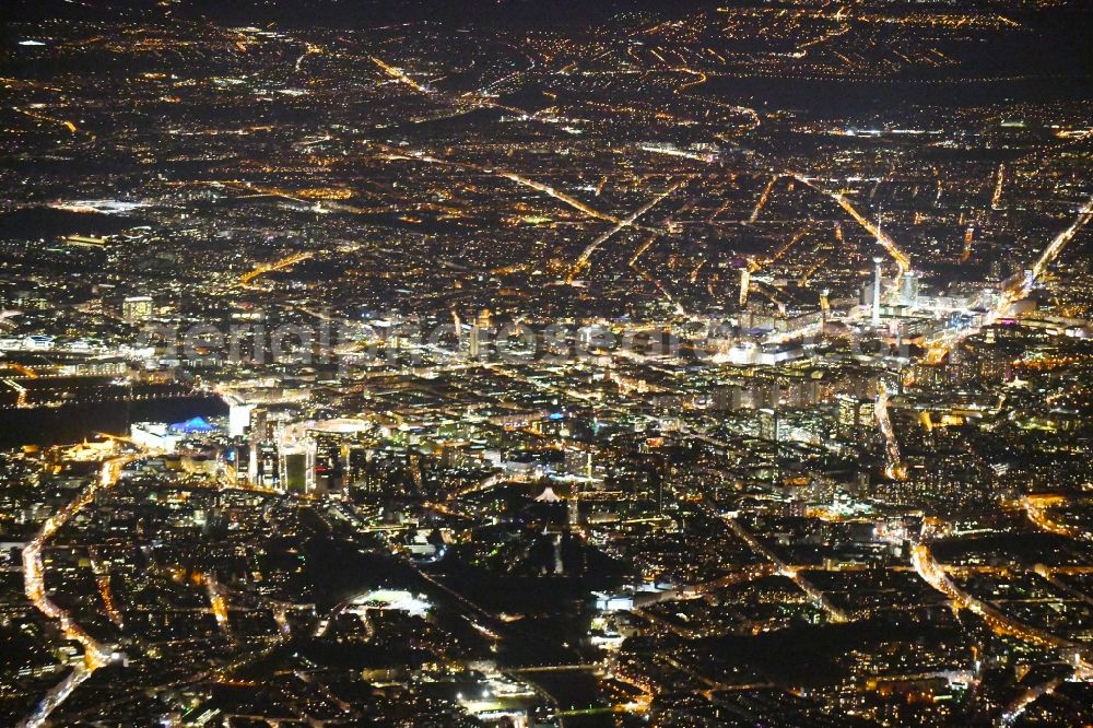 Aerial image at night Berlin - Night lighting City view of the city area of in the district Mitte in Berlin, Germany