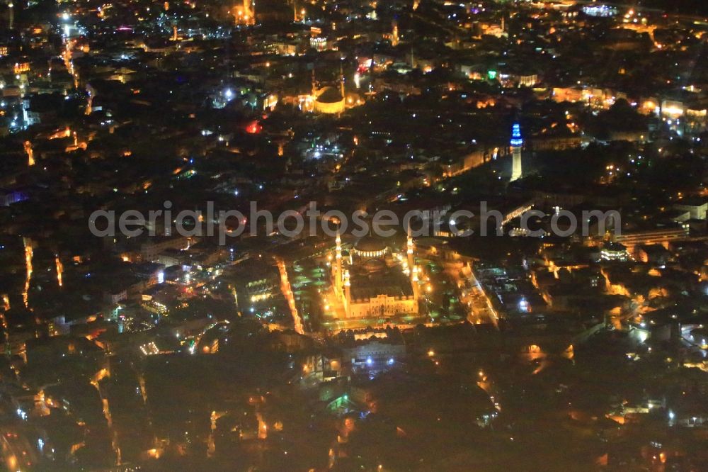 Aerial image at night Istanbul - Night lighting city view on down town with Sueleymaniye Camii mosque and Beyazit Tower in the district Fatih in Istanbul in Turkey