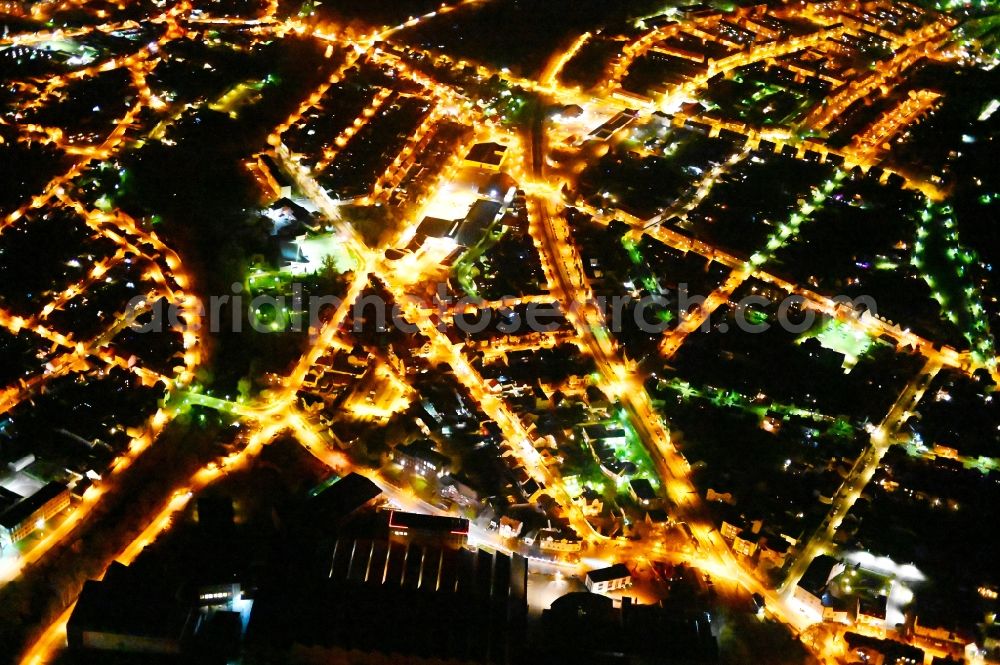 Aerial image at night Thale - Night lighting city view on down town in Thale in the state Saxony-Anhalt, Germany