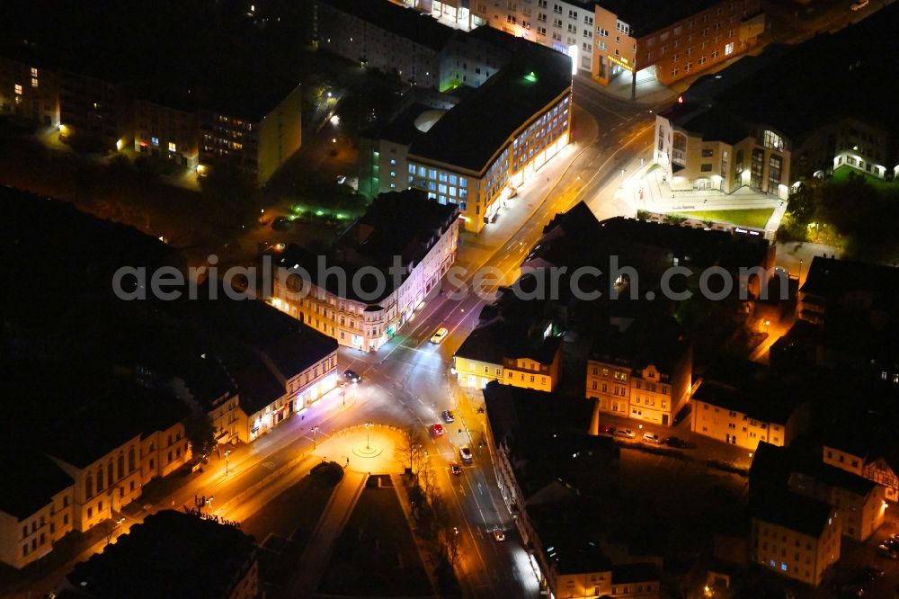 Fürstenwalde/Spree at night from the bird perspective: Night lighting City view of downtown area along the Eisenbahnstrasse in Fuerstenwalde/Spree in the state Brandenburg, Germany