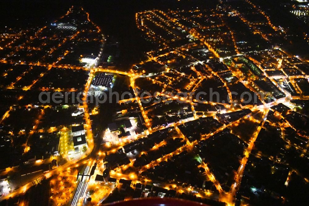 Fürstenwalde/Spree at night from the bird perspective: Night lighting City view of downtown area in Fuerstenwalde/Spree in the state Brandenburg, Germany