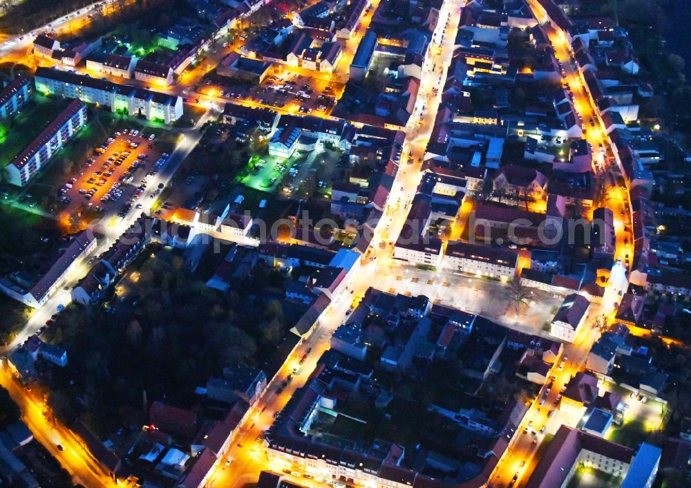 Strausberg at night from above - Night lighting City view of downtown area on Markt along the Grossen Strasse in Strausberg in the state Brandenburg, Germany