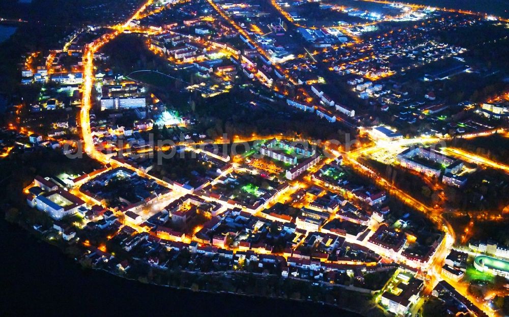 Strausberg at night from above - Night lighting City view of downtown area on Markt along the Grossen Strasse in Strausberg in the state Brandenburg, Germany