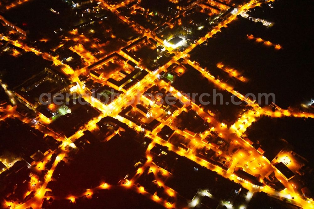 Seelow at night from above - Night lighting City view of downtown area in Seelow in the state Brandenburg, Germany