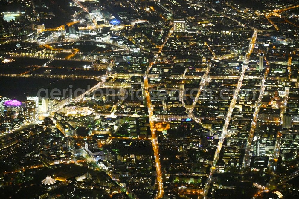 Aerial photograph at night Berlin - Night lighting City view of downtown area Stresemannstrasse - Wilhelmstrasse - Leipziger Strasse - Friedrichstrasse in the district Mitte in Berlin, Germany