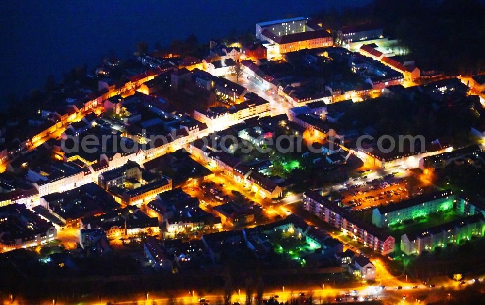 Aerial photograph at night Strausberg - Night lighting City view of downtown area on Ufer of Stausee in Strausberg in the state Brandenburg, Germany