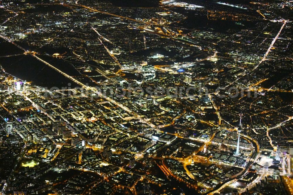 Berlin at night from above - Night lighting City view of downtown area Unter den Linden - Leipziger Strasse - Rathausstrasse in the district Mitte in Berlin, Germany