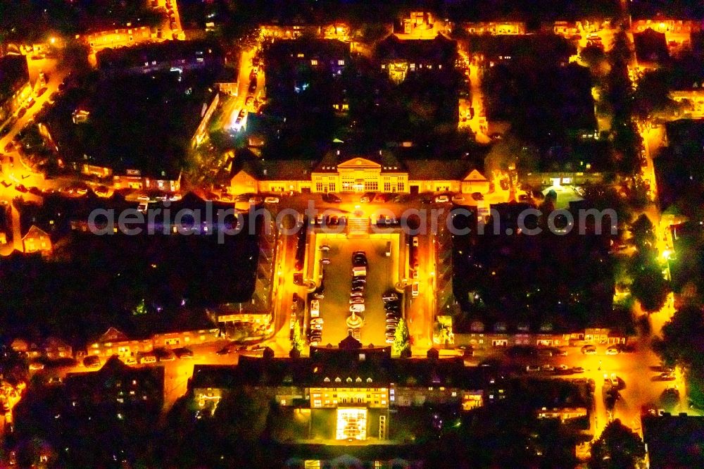 Aerial image at night Essen - Night lighting city view near the little market with a branch of the Edeka supermarket in Essen in the state North Rhine-Westphalia