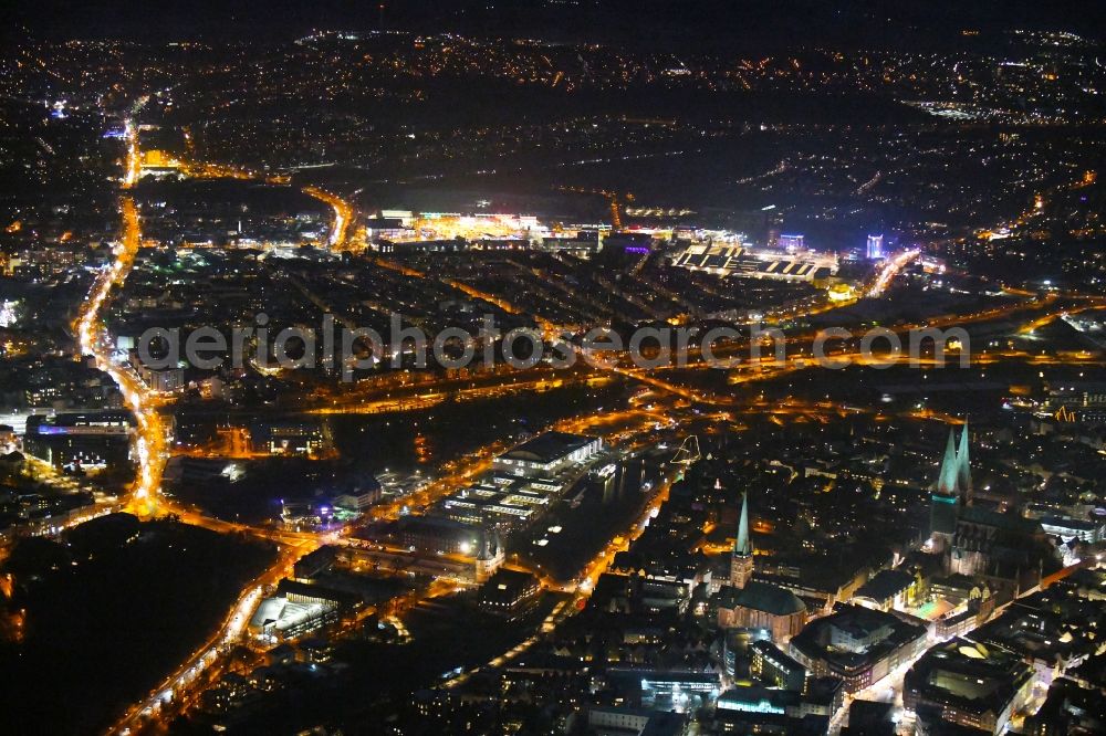 Lübeck at night from above - Night lighting city view on the river bank Stadtgraben - Obertrave in the district Innenstadt in Luebeck in the state Schleswig-Holstein, Germany