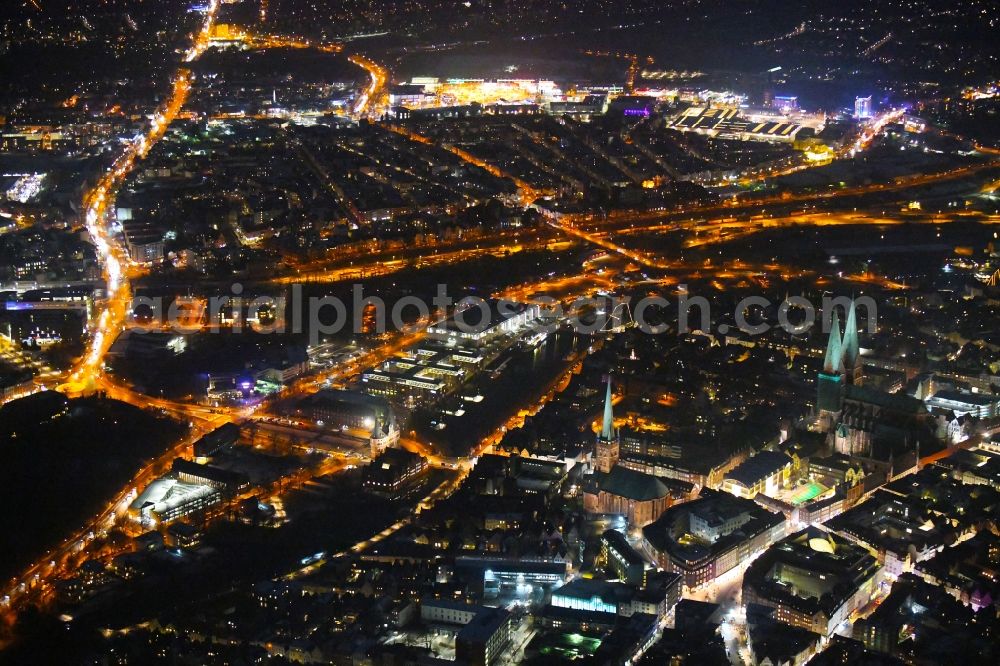 Aerial photograph at night Lübeck - Night lighting city view on the river bank Stadtgraben - Obertrave in the district Innenstadt in Luebeck in the state Schleswig-Holstein, Germany