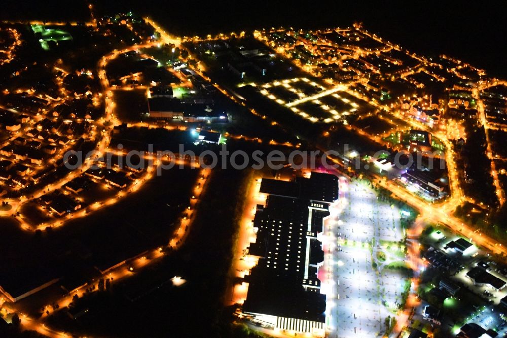 Aerial image at night Neubrandenburg - Night lighting Southerly outskirts residential along the federal street F 96 - E251 in Neubrandenburg in the state Mecklenburg - Western Pomerania, Germany