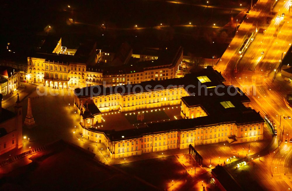 Potsdam at night from above - Night lighting Night lights and illumination of the city palace and seat of the Brandenburg State Parliament in Potsdam in the federal state of Brandenburg