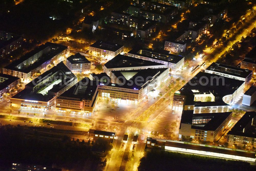 Berlin at night from the bird perspective: Night lighting Ensemble space on center Helle Mitte on Alice-Salomon-Platz in the district Hellersdorf in Berlin, Germany