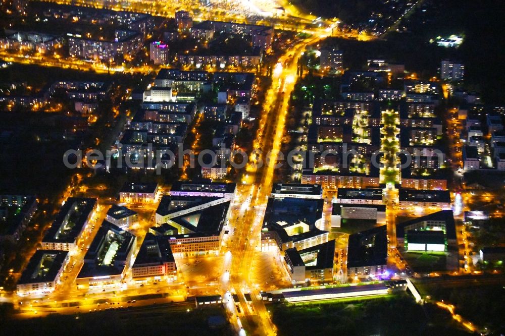 Aerial image at night Berlin - Night lighting ensemble space on center Helle Mitte on Alice-Salomon-Platz in the inner city center in the district Hellersdorf in Berlin, Germany