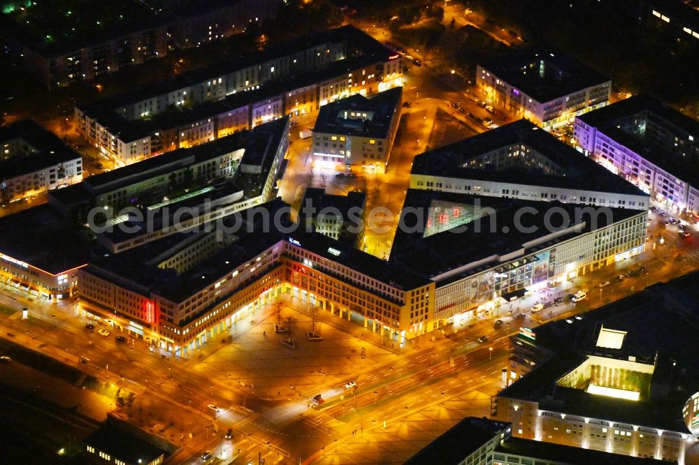 Aerial image at night Berlin - Night lighting ensemble space on center Helle Mitte on Alice-Salomon-Platz in the inner city center in the district Hellersdorf in Berlin, Germany