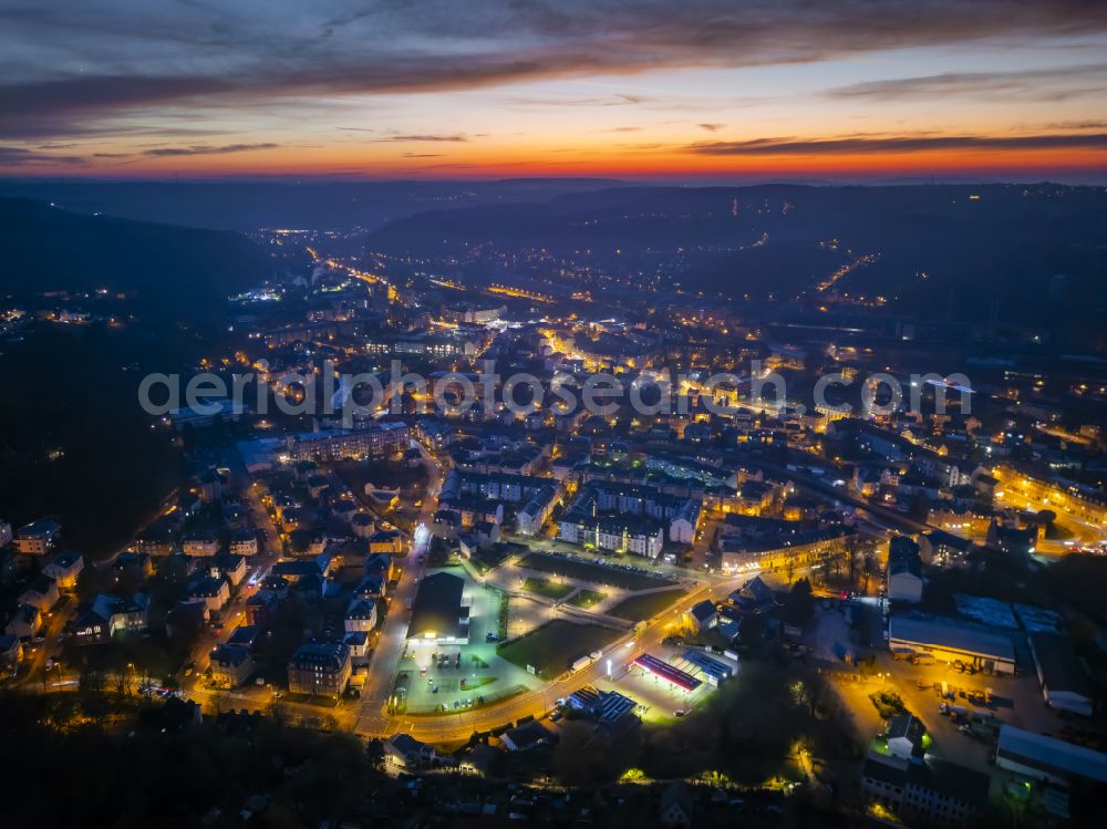 Aerial image at night Freital - Night lights and lighting city center in the inner city area in Freital Deuben in the state of Saxony, Germany