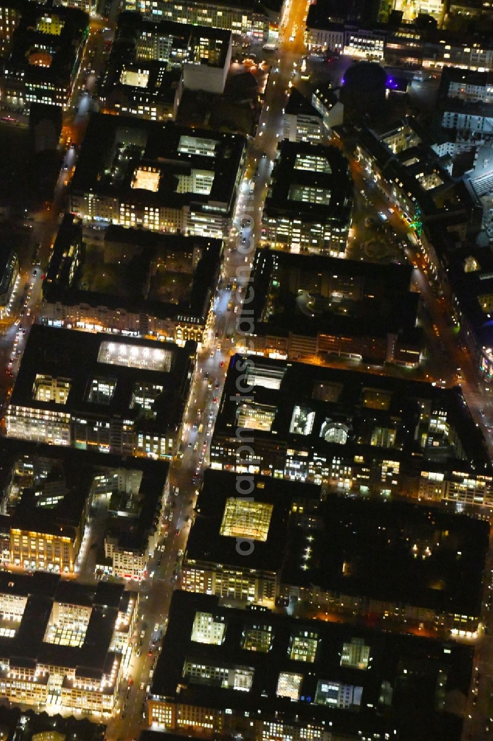 Berlin at night from above - Night lighting The city center in the downtown area Friedrichstrasse - Gendarmenmarkt in the district Mitte in Berlin, Germany