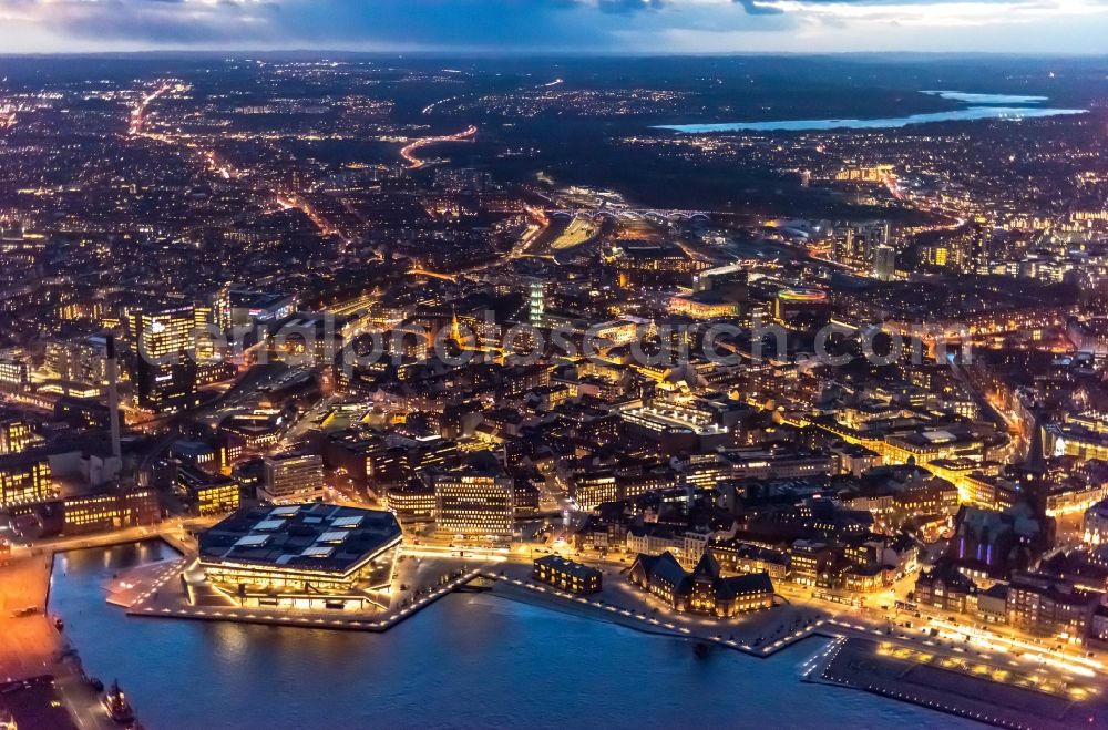 Aarhus at night from the bird perspective: Night lighting the city center in the downtown area on Hack Konpmanns Platz in the district Midtbyen in Aarhus in Region Midtjylland, Denmark