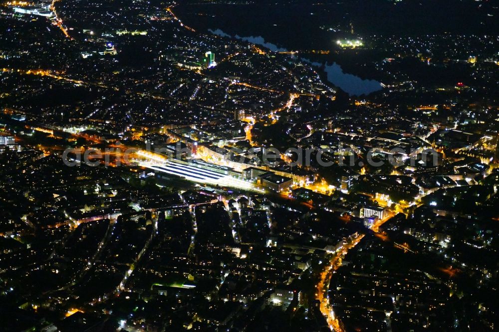 Münster at night from above - Night lighting The city center in the downtown area on Central Station in Muenster in the state North Rhine-Westphalia, Germany