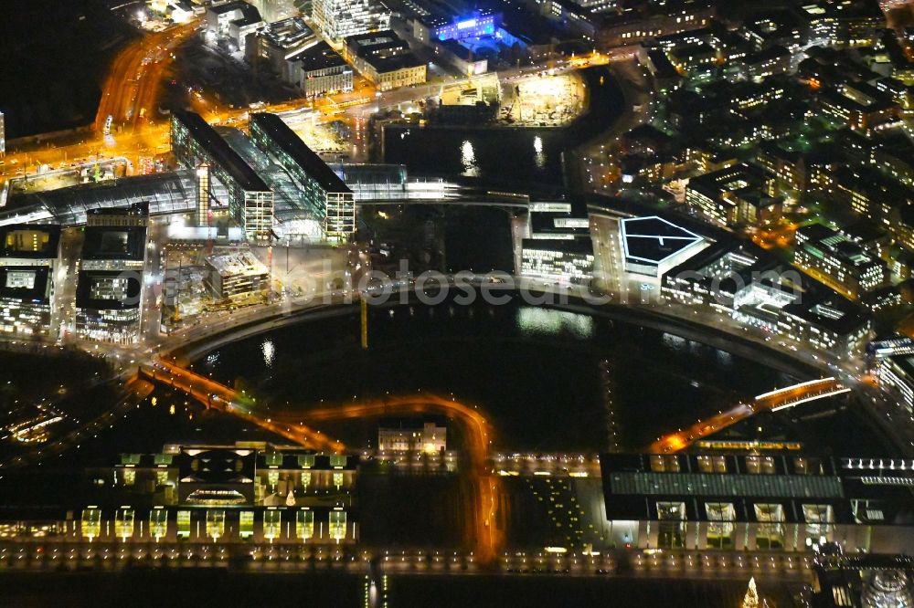 Berlin at night from the bird perspective: Night lighting City center in the downtown area on the banks of river course of Spree River in the district Tiergarten in Berlin, Germany