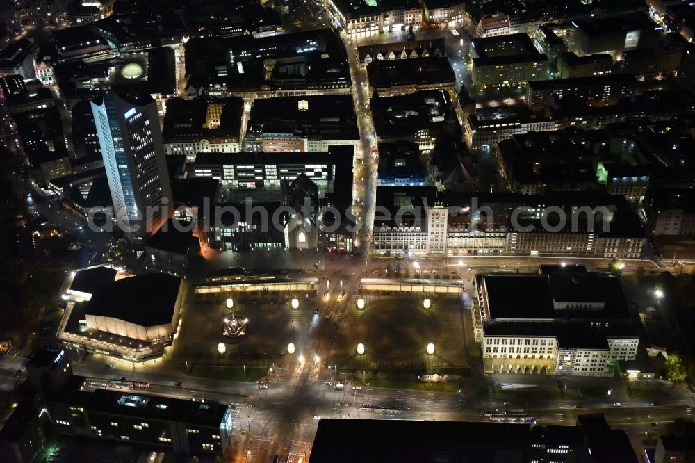 Leipzig at night from the bird perspective: Night aerial view of the city center in the downtown area between MBR and university skyscraper, Gewandhaus concert hall of the Opera on Augustusplatz in Leipzig in Saxony