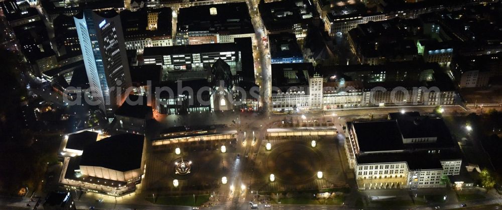 Aerial photograph at night Leipzig - Night aerial view of the city center in the downtown area between MBR and university skyscraper, Gewandhaus concert hall of the Opera on Augustusplatz in Leipzig in Saxony