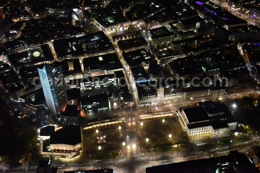 Aerial image at night Leipzig - Night aerial view of the city center in the downtown area between MBR and university skyscraper, Gewandhaus concert hall of the Opera on Augustusplatz in Leipzig in Saxony