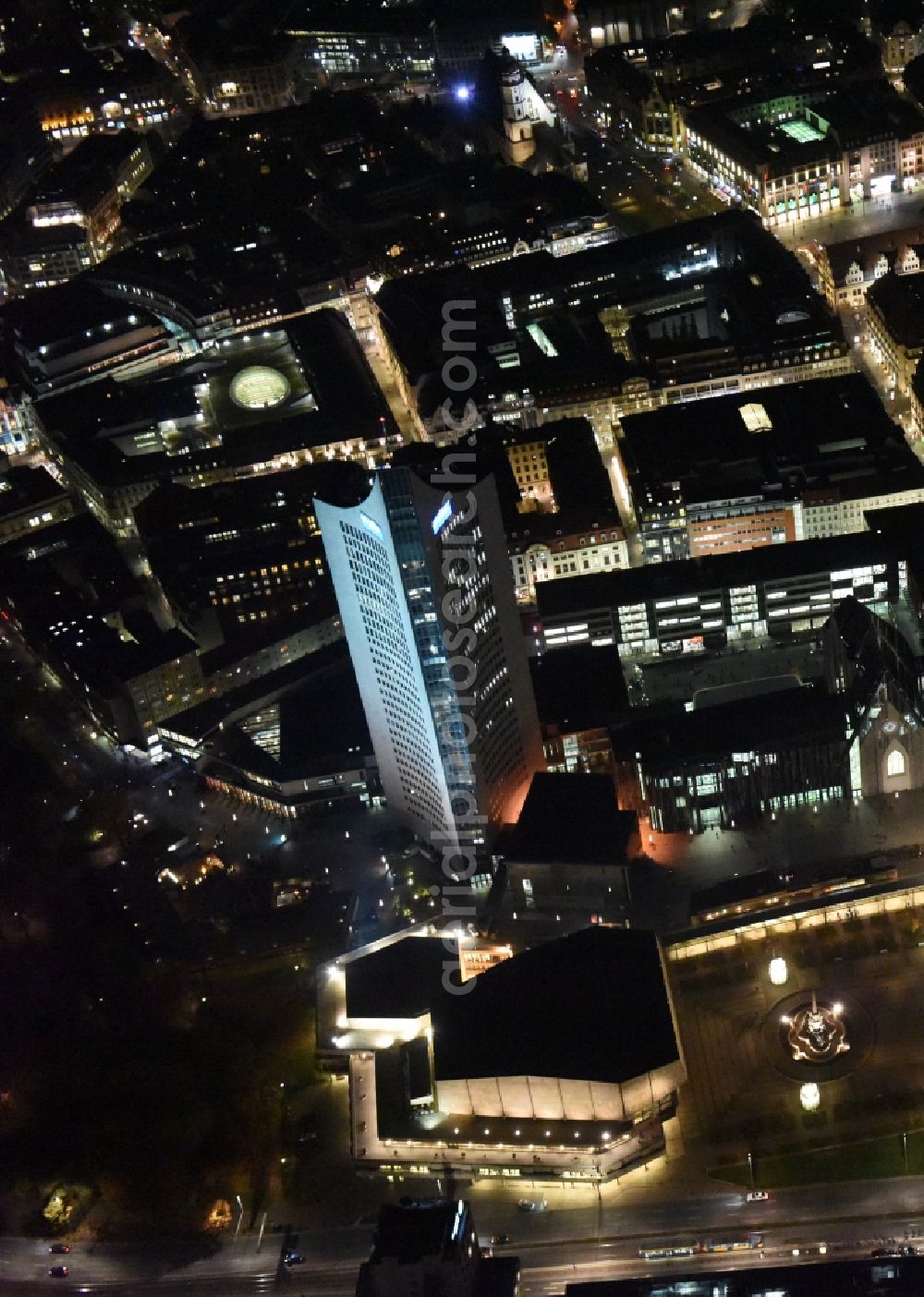 Leipzig at night from above - Night aerial view of the city center in the downtown area between MBR and university skyscraper, Gewandhaus concert hall of the Opera on Augustusplatz in Leipzig in Saxony