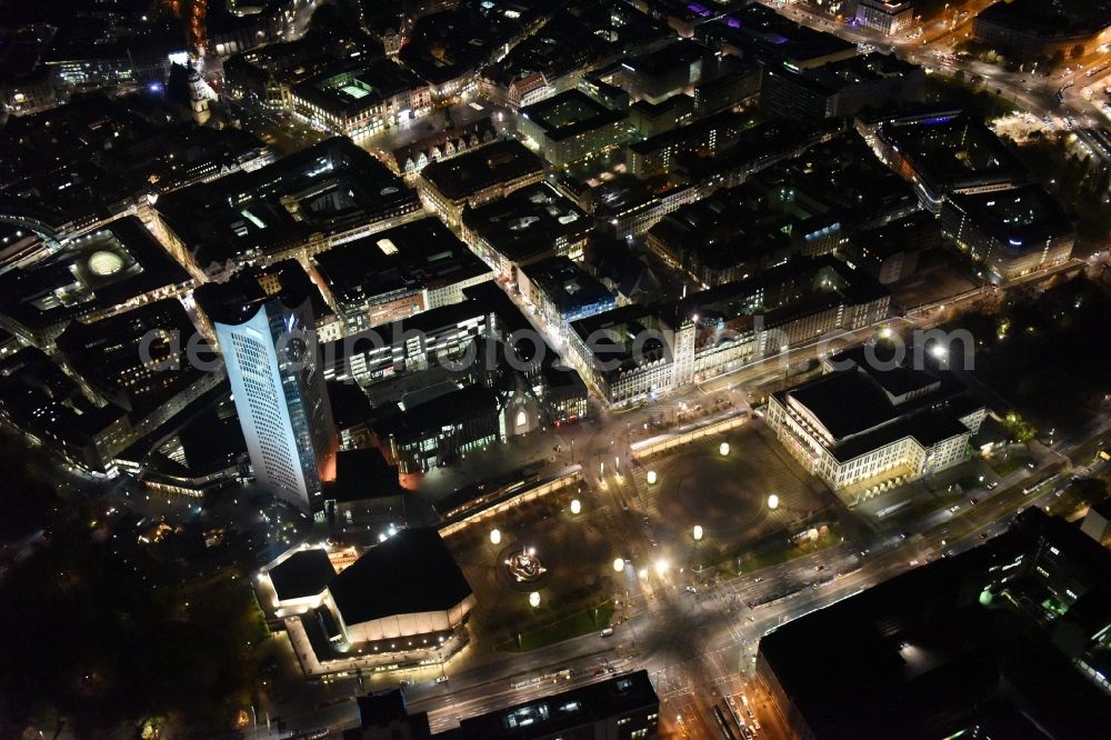 Leipzig at night from the bird perspective: Night aerial view of the city center in the downtown area between MBR and university skyscraper, Gewandhaus concert hall of the Opera on Augustusplatz in Leipzig in Saxony