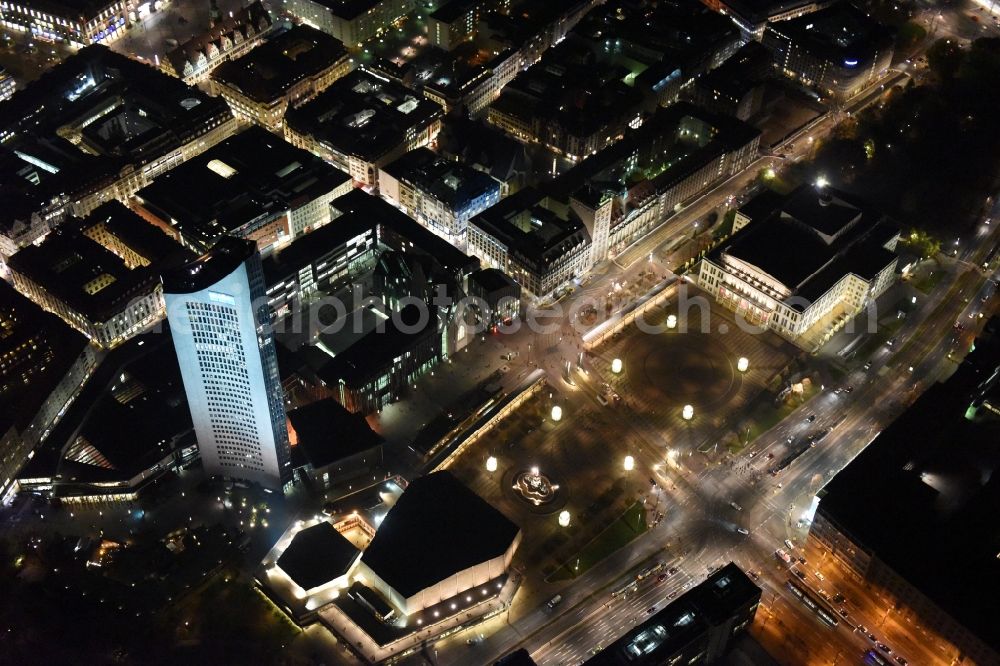 Aerial photograph at night Leipzig - Night aerial view of the city center in the downtown area between MBR and university skyscraper, Gewandhaus concert hall of the Opera on Augustusplatz in Leipzig in Saxony