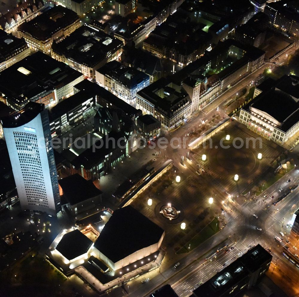 Aerial image at night Leipzig - Night aerial view of the city center in the downtown area between MBR and university skyscraper, Gewandhaus concert hall of the Opera on Augustusplatz in Leipzig in Saxony