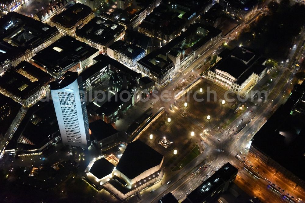 Leipzig at night from above - Night aerial view of the city center in the downtown area between MBR and university skyscraper, Gewandhaus concert hall of the Opera on Augustusplatz in Leipzig in Saxony