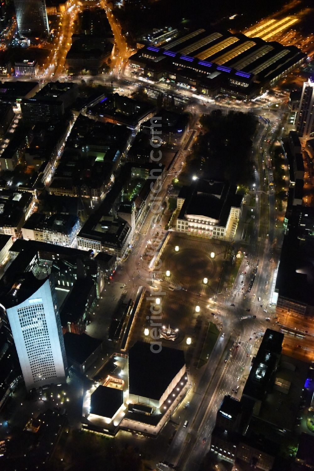 Leipzig at night from the bird perspective: Night aerial view of the city center in the downtown area between MBR and university skyscraper, Gewandhaus concert hall of the Opera on Augustusplatz in Leipzig in Saxony