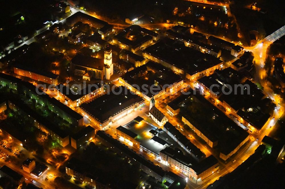 Fürstenwalde/Spree at night from above - Night lighting The city center in the downtown area with the St. Marien Kirche and the Altes Rathaus in Fuerstenwalde/Spree in the state Brandenburg, Germany