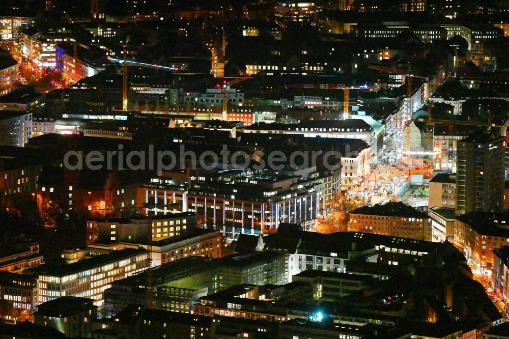 Aerial image at night München - Night lighting the city center in the downtown area on street Bahnhofplatz - Luisenstrasse in the district Ludwigsvorstadt-Isarvorstadt in Munich in the state Bavaria, Germany