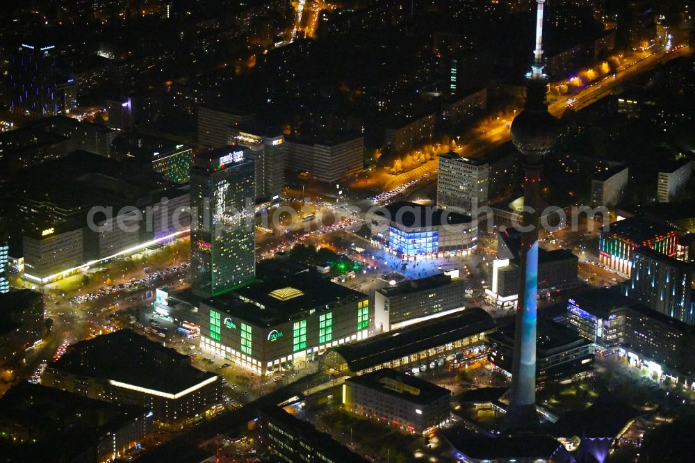 Berlin at night from above - Night lighting The city center in the downtown area Ost on Berliner Fernsehturm - Alexanderstrasse - Rathausstrasse in the district Mitte in Berlin, Germany