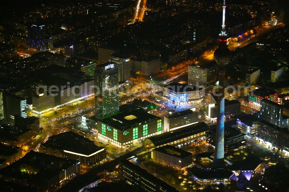 Berlin at night from the bird perspective: Night lighting The city center in the downtown area Ost on Berliner Fernsehturm - Alexanderstrasse - Rathausstrasse in the district Mitte in Berlin, Germany