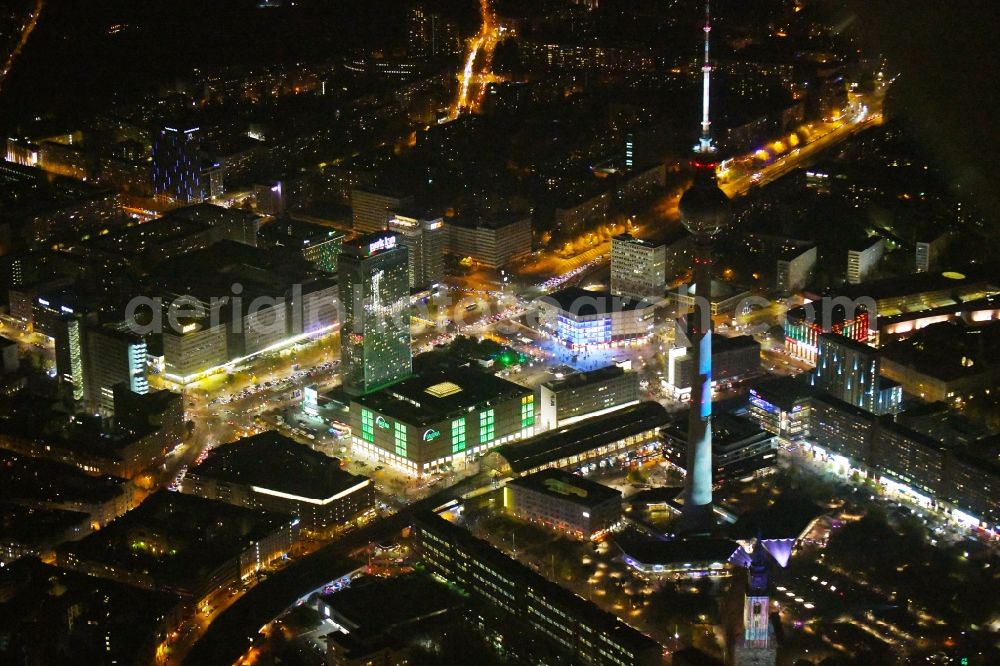 Aerial photograph at night Berlin - Night lighting The city center in the downtown area Ost on Berliner Fernsehturm - Alexanderstrasse - Rathausstrasse in the district Mitte in Berlin, Germany