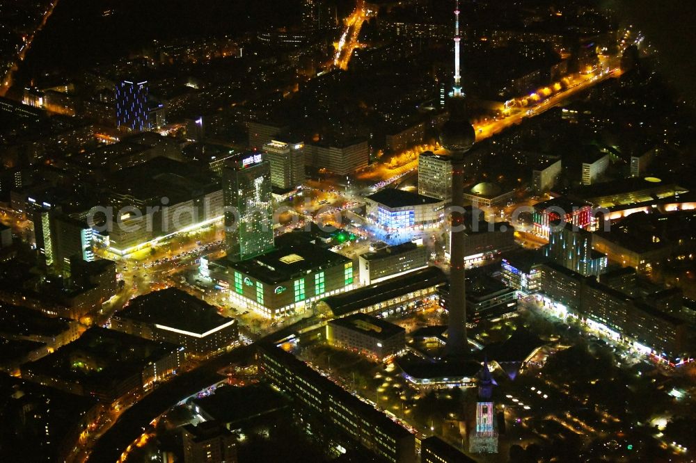 Berlin at night from above - Night lighting The city center in the downtown area Ost on Berliner Fernsehturm - Alexanderstrasse - Rathausstrasse in the district Mitte in Berlin, Germany